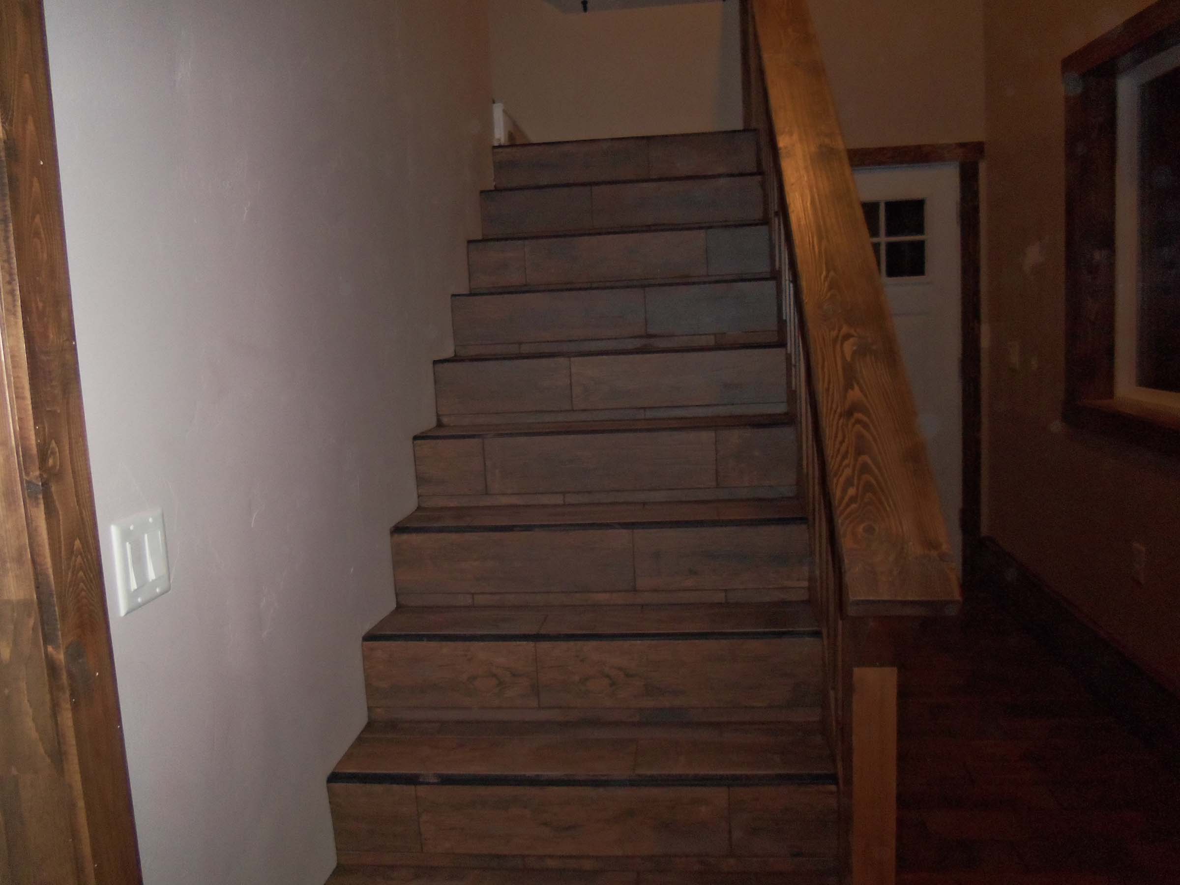 Stairs tiled with wood look tile