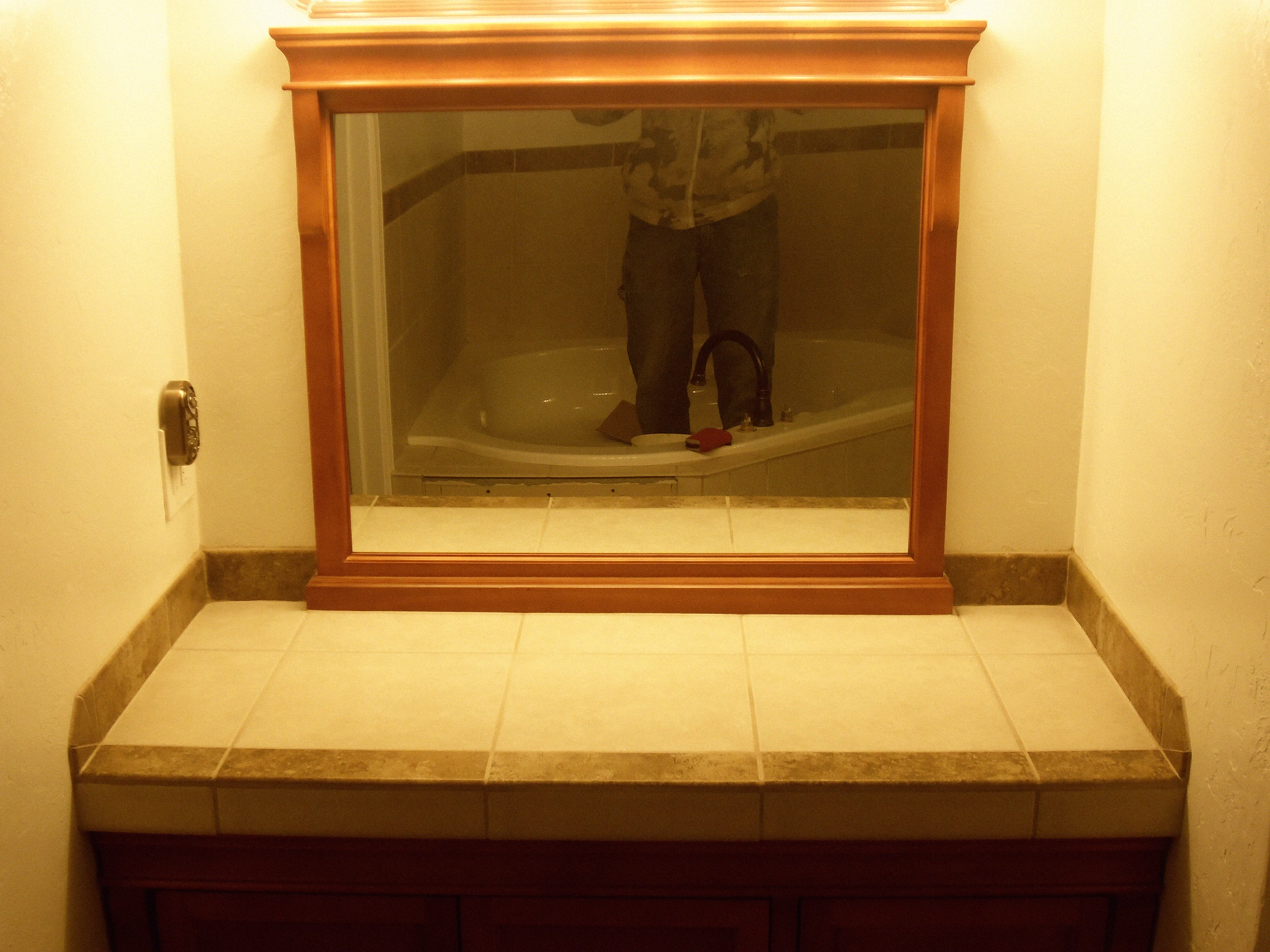 Tiled counter with small backsplash