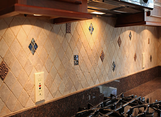 Tiled kitchen backsplash with design insets