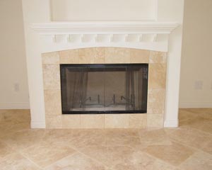 Tiled kitchen floor and fireplace